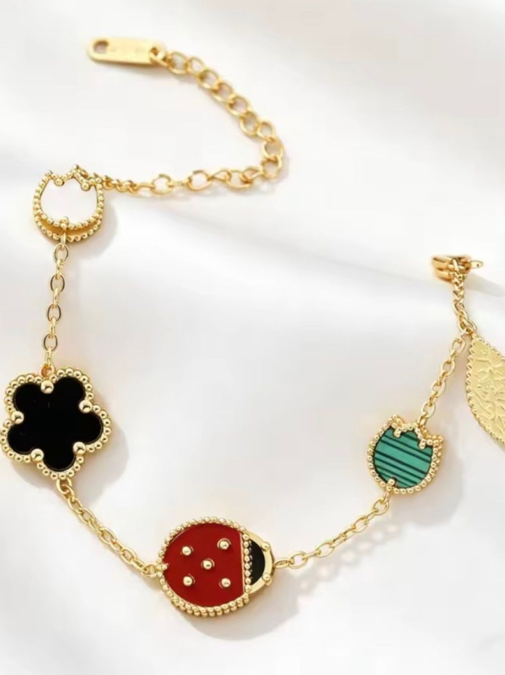 Gold-Tone Charm Bracelet with Red, Black, Green, White Accents - Picture 2 of 4